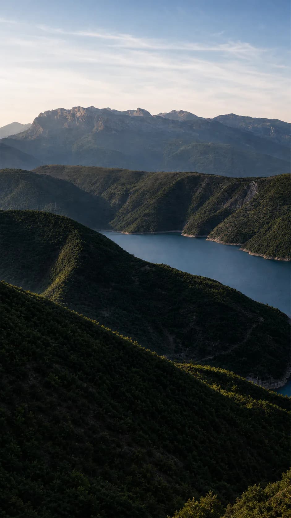 Highland reservoir and mountains of Kukës at dawn